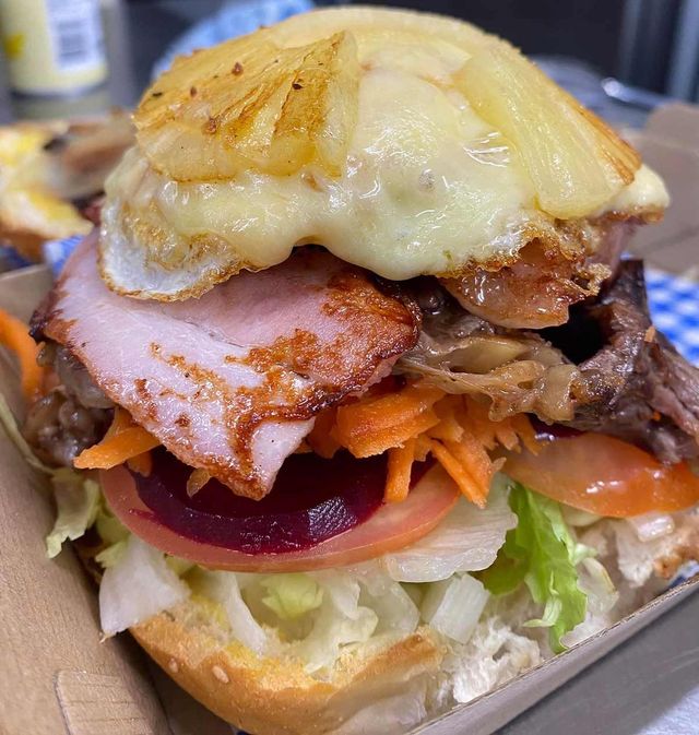 A Close Up of a Sandwich With Meat — Cedar Park Fish & Chips In Taranganba, QLD