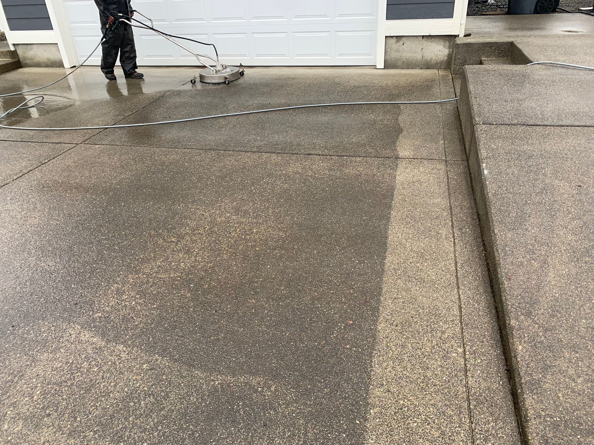 Pressure washing a driveway in Shelton, WA