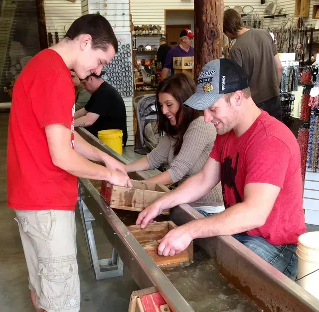 Guests mining for gemstones at Dells Mining Co. in Wisconsin Dells