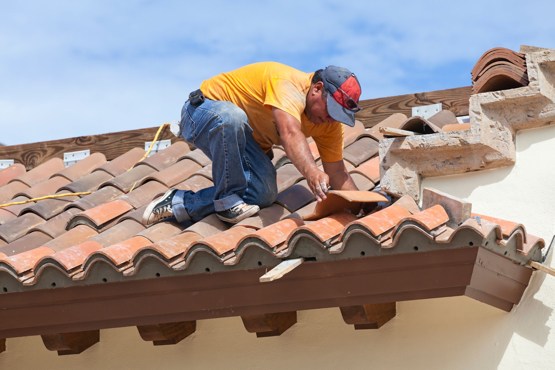 A Man Is Working on the Roof of a Building | Warragul, VIC | Roofshield