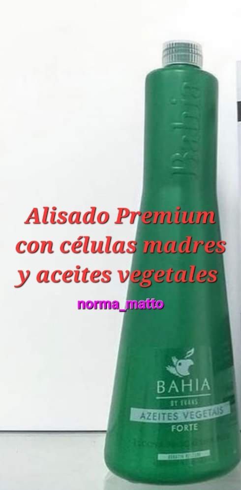 Green bottle of hair product with text: 