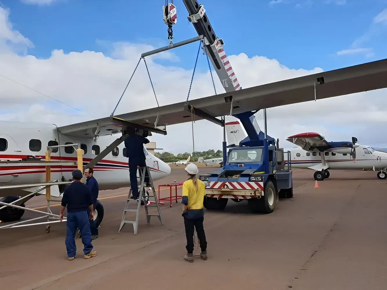Crane Lifting an Aircraft Wing — Mareeba Crane Hire In Mareeba, QLD