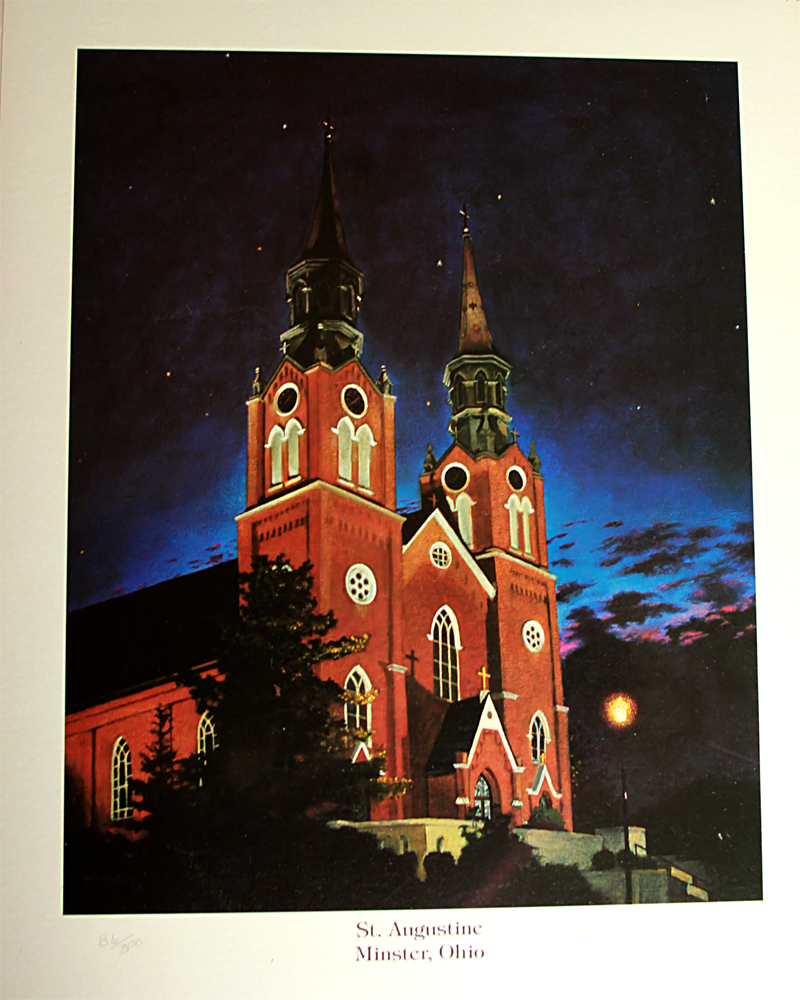 Lit church with twin spires at dusk against a dark blue sky