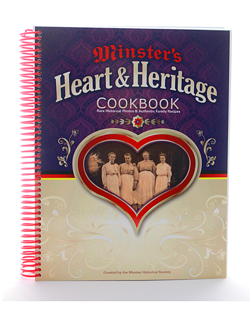 Winster’s Heart & Heritage Cookbook with red spiral binding and vintage-style cover art