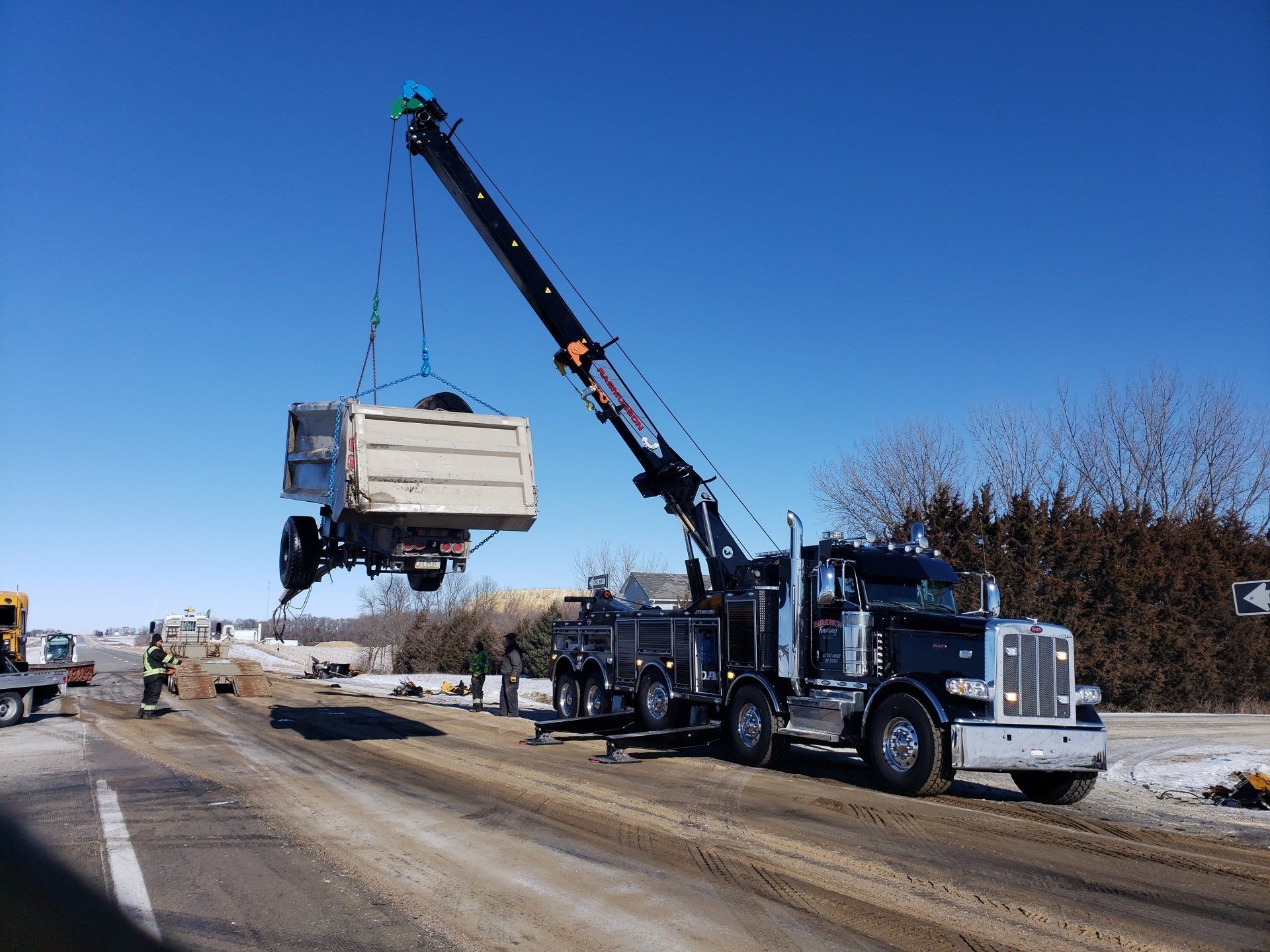 Towing Construction Vehicle — Cedar Falls, IA — Rasmusson Towing Towing Construction Vehicle — Cedar Falls, IA — Rasmusson Towing
