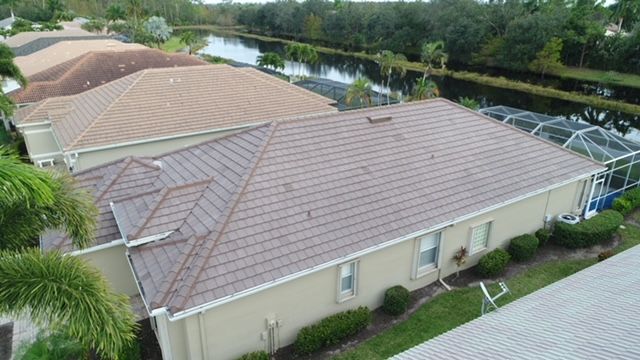 An aerial view of a house with a tiled roof.