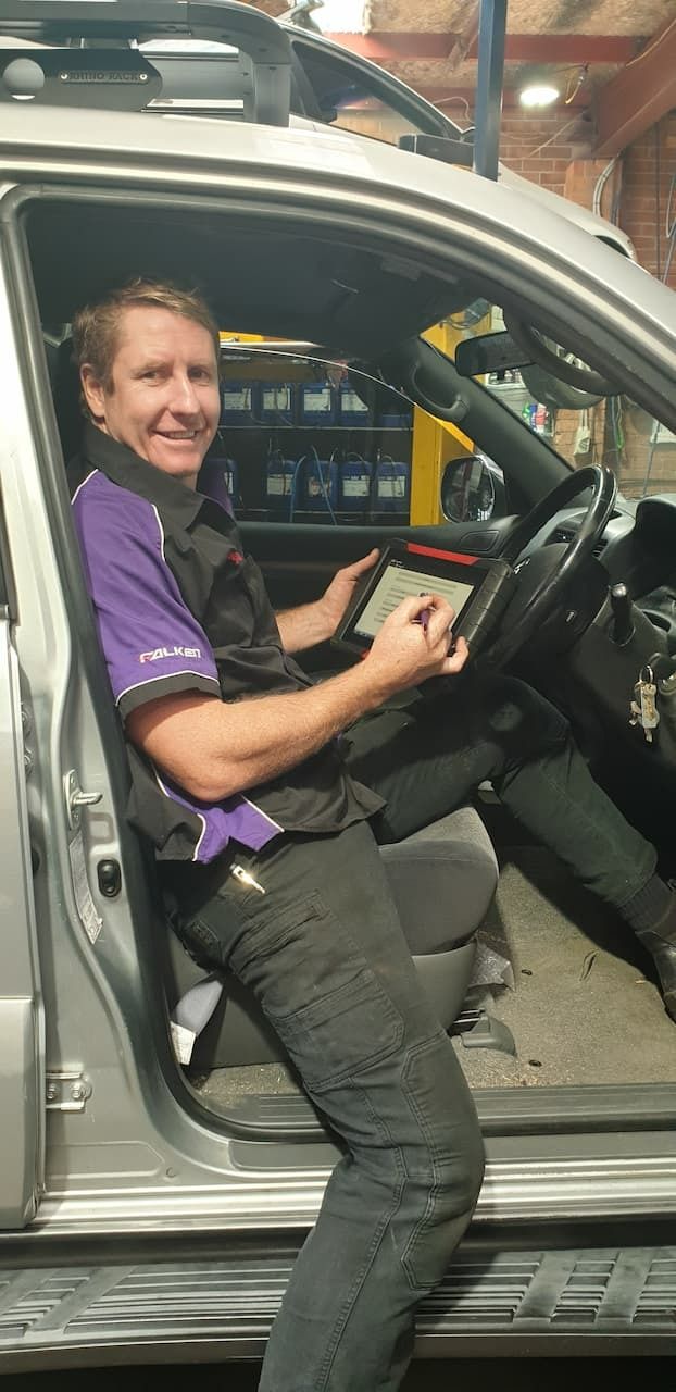 A mechanic in Newcastle performing in a car performing a diagnostics check — AutoHop Lambton in Lambton, NSW