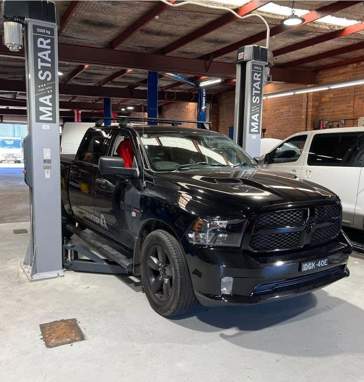 Mechanic Workshop With Quality Tools And Vehicle Hoists — AutoHop Lambton in Lambton, NSW