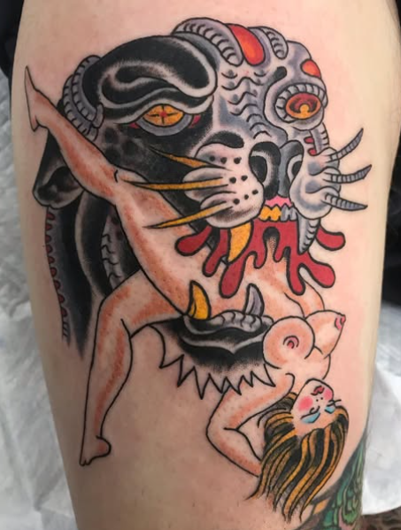 A bio-mechanical inspired tattoo of a black panther cyborg swallowing a lady done at Classic Tattoo