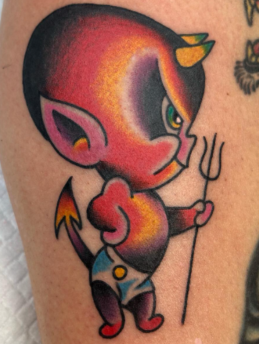 Traditional American Hot Stuff (little devil) tattoo done by Rylee Jennings