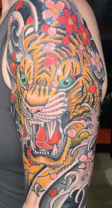 Traditional Japanese tiger arm sleeve tattoo done by Nick Barnett at Classic Tattoo in Scott's Addition RVA