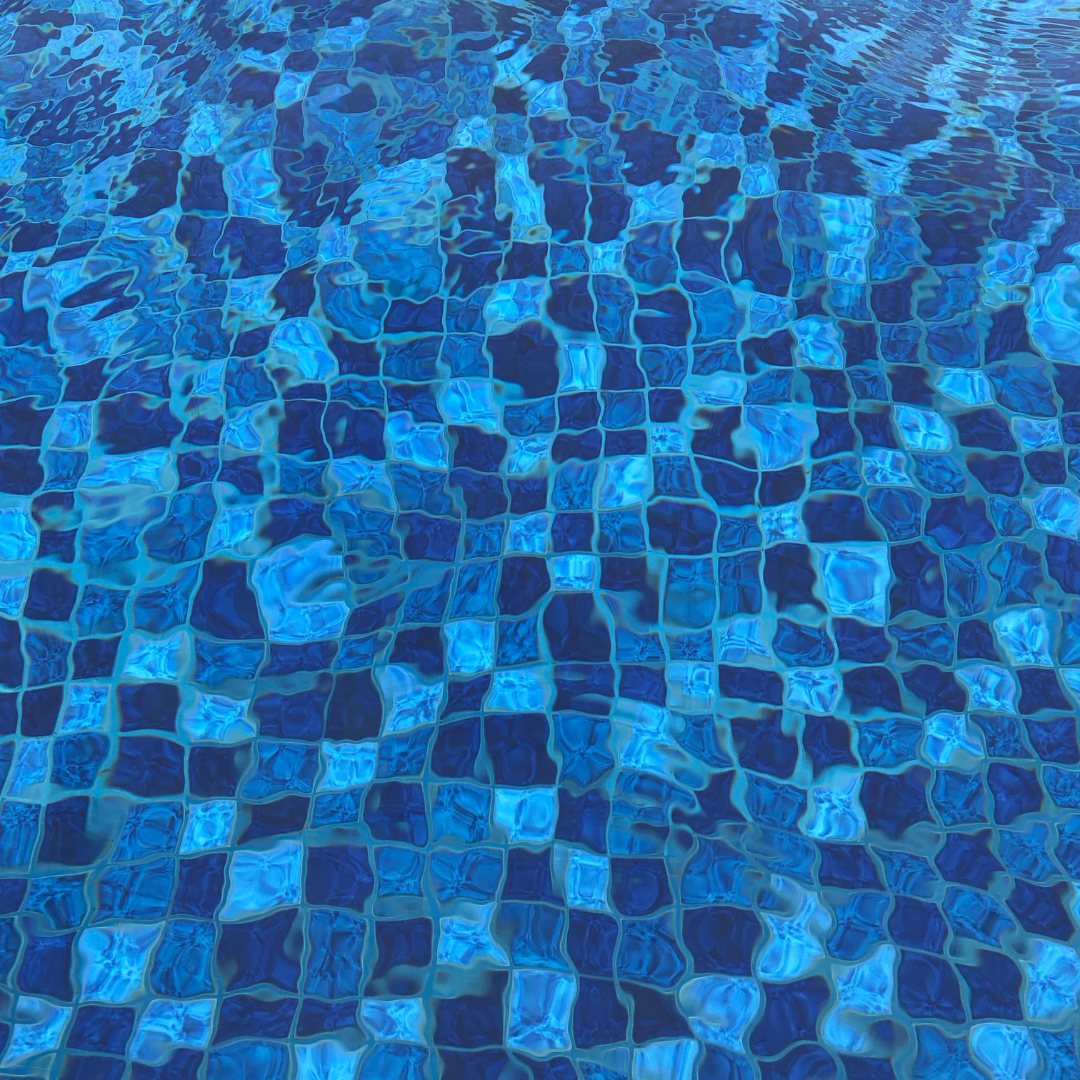 Blue and dark blue tiled pool water with ripples.