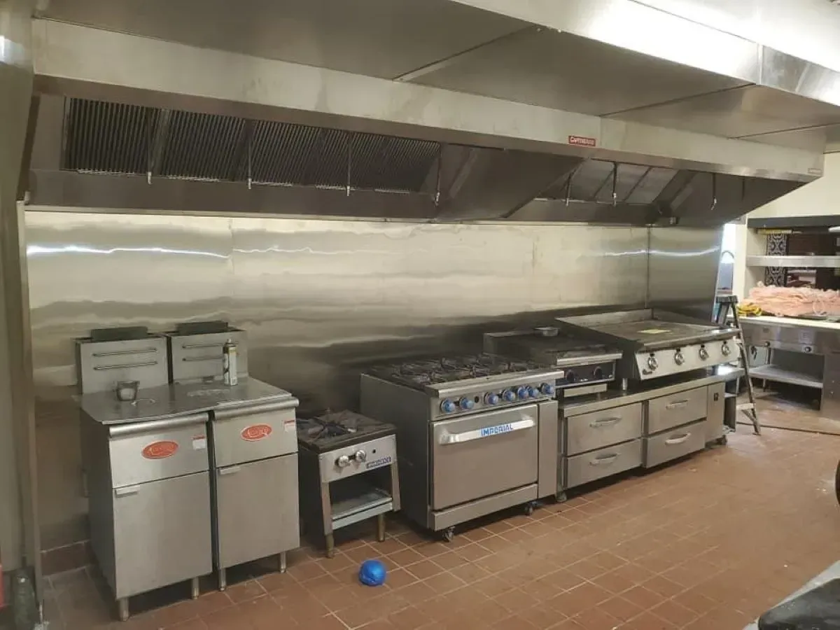 A kitchen with a lot of stainless steel appliances