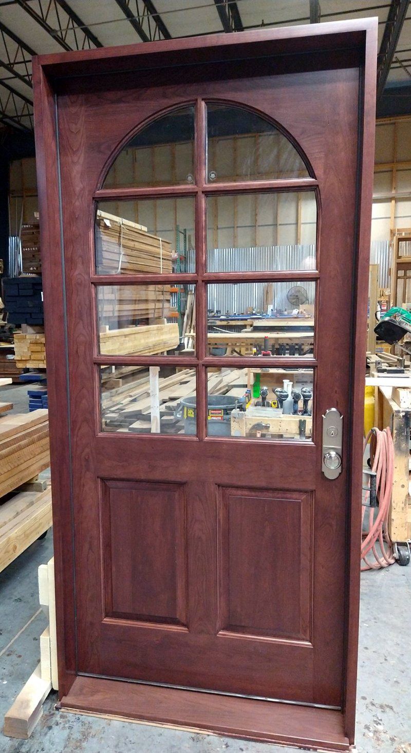 Single prehung rectangular Cherry door with arched 6 TDL