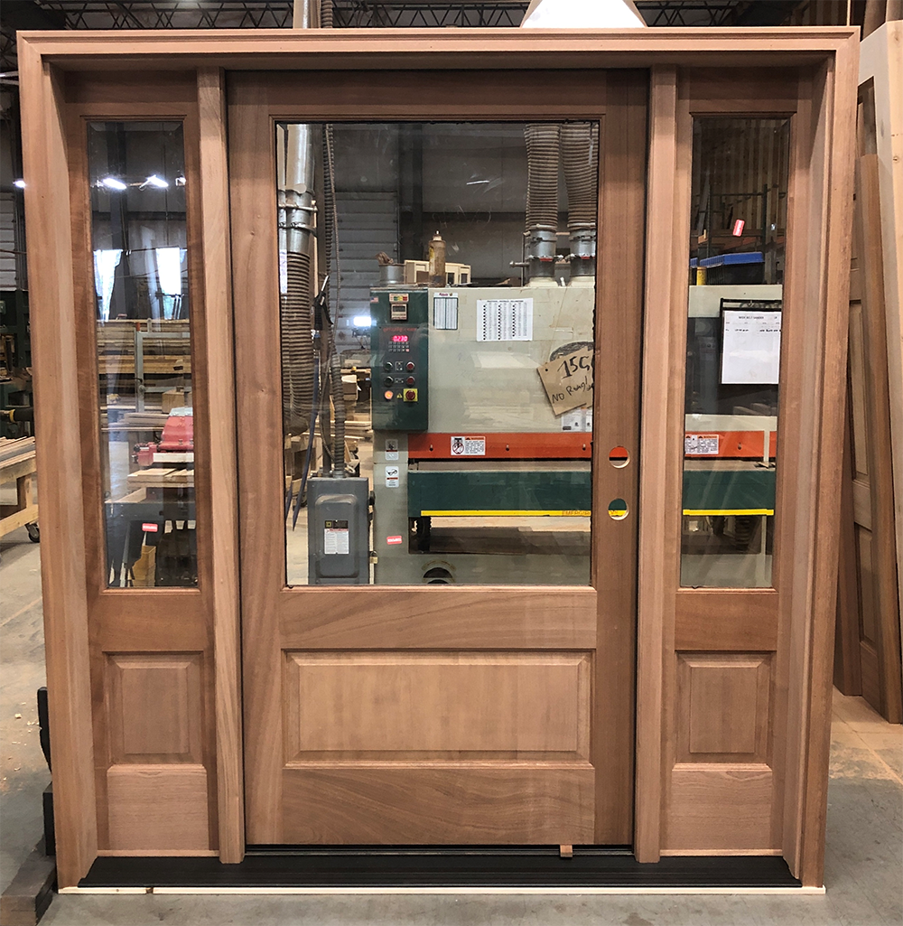 Mahogany front door with sidelights and beveled glass