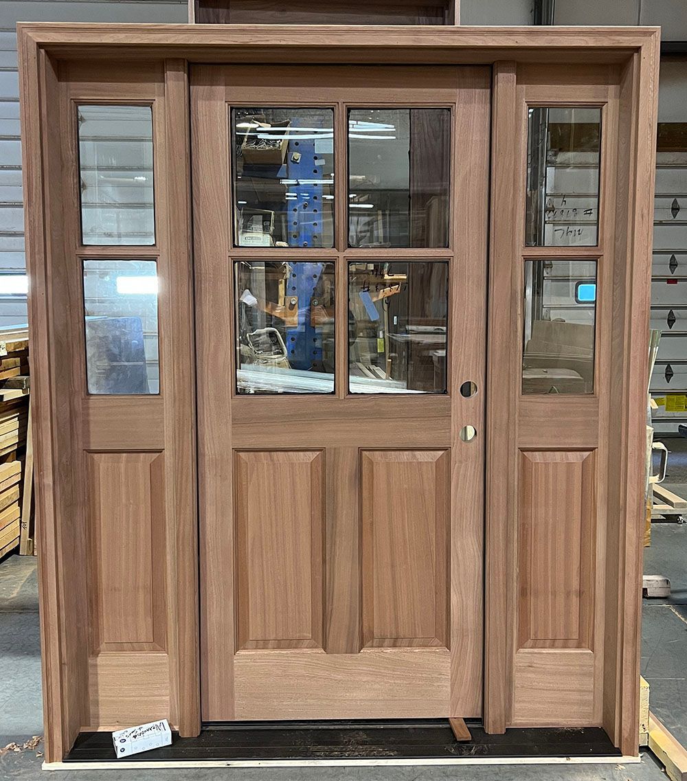 Traditional half-lite entry door with sidelights