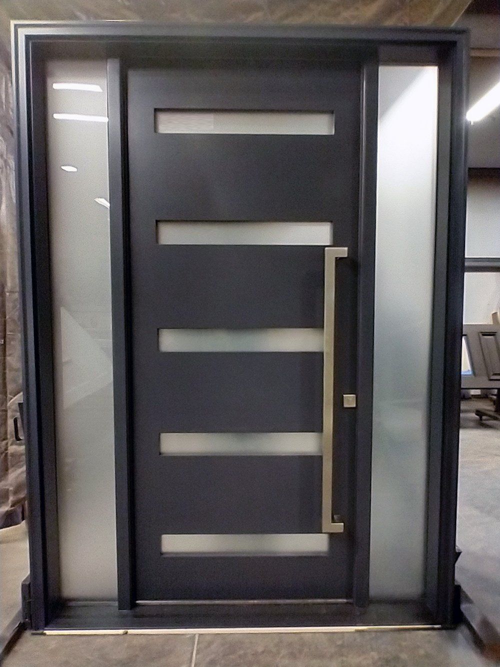 Modern entry door with sidelights Acid etch glass Contemporary multi-point with offset pull handle Painted tricorn black