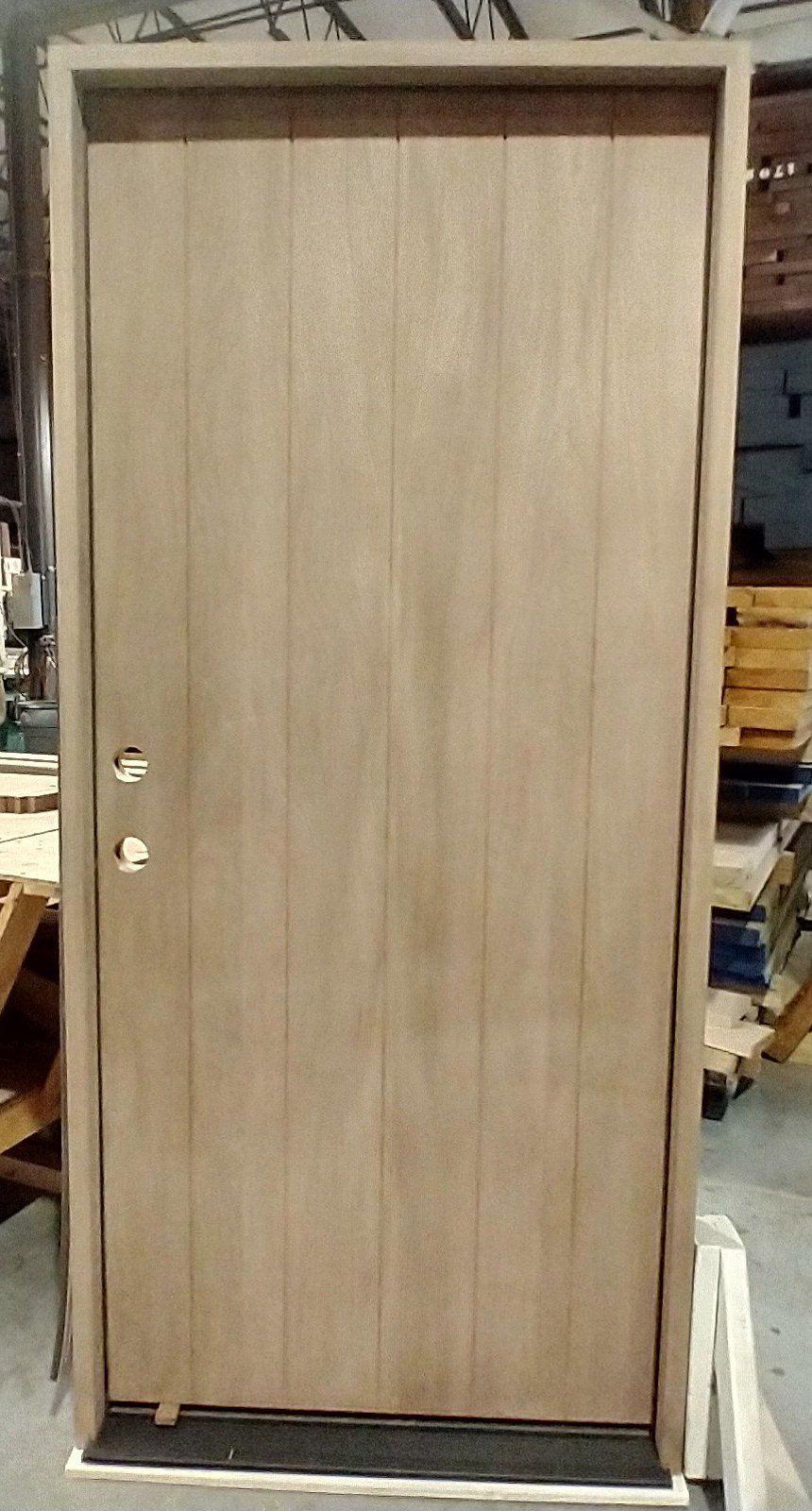 Mahogany flush doors with vertical v-grooves.