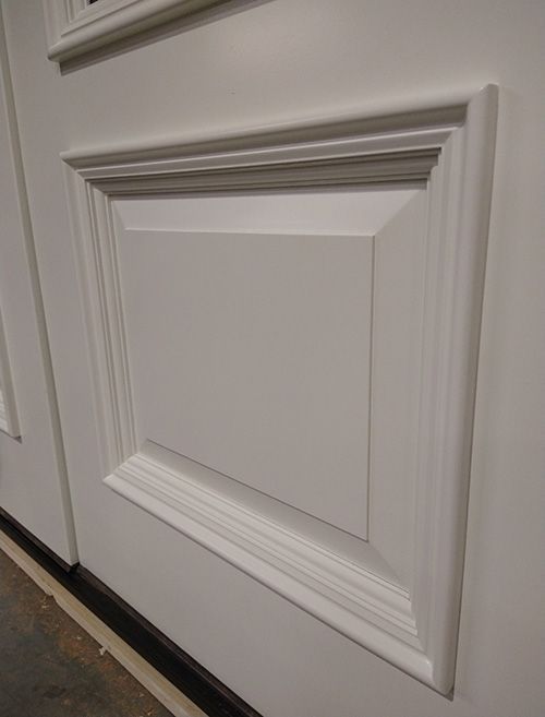 Mahogany double door painted in Behr Fresh Dew