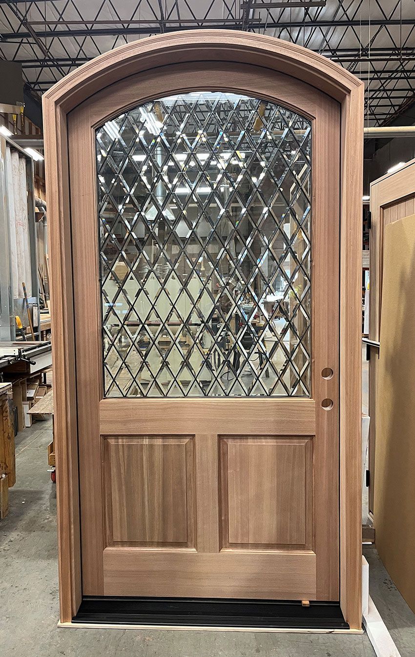 Bella #28804
Mahogany door 
Diamond beveled glass with dark patina caming