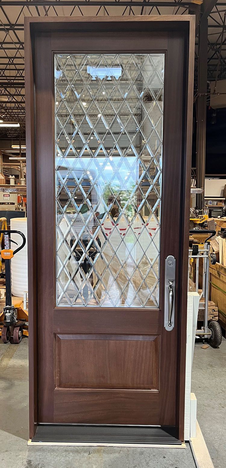 Blum #28440
Mahogany door with diamond beveled glass with zinc caming
Finished in Chappo