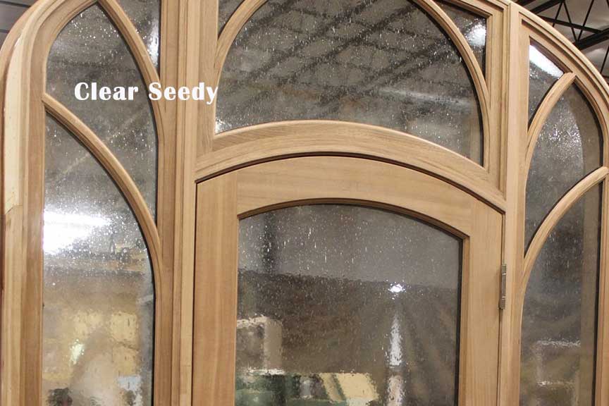 A wooden window with clear seedy written on it