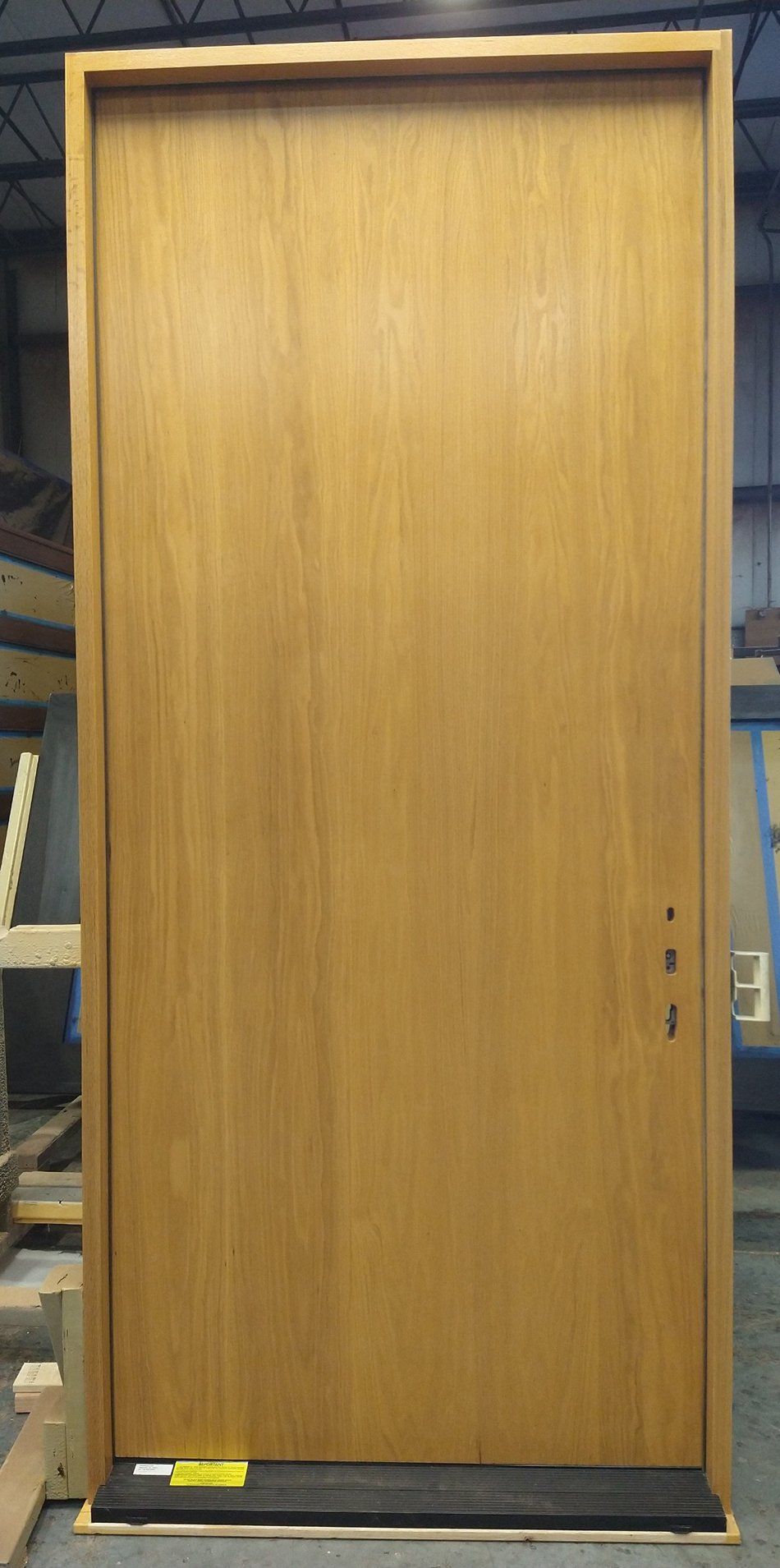 Haddon #26603 Red oak flush door Finished in honey clear coat