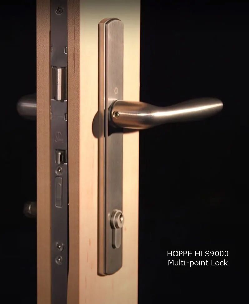 A close up of a door with a stainless steel handle