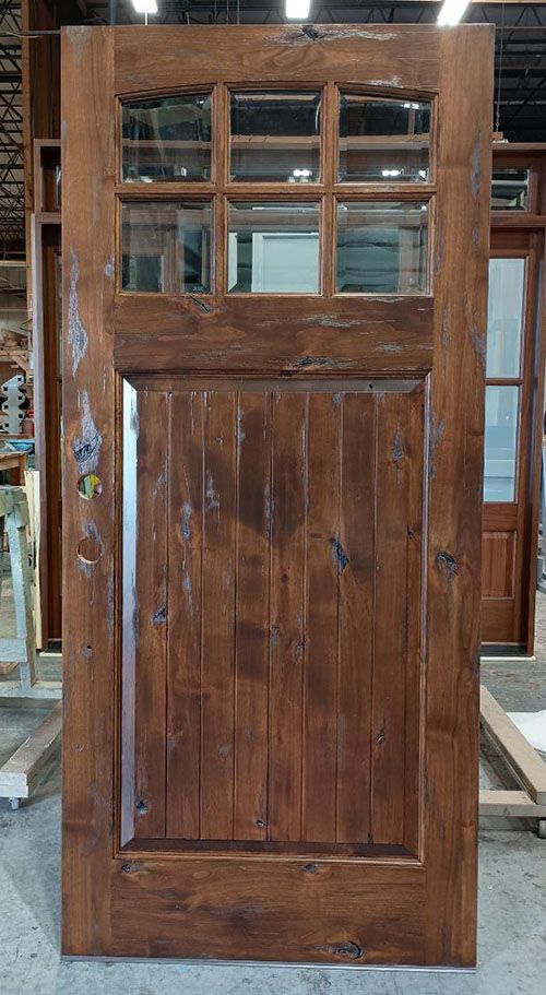 Rigilano #28378
Knotty alder with hand distressing & beveled glass
Finished in Chappo