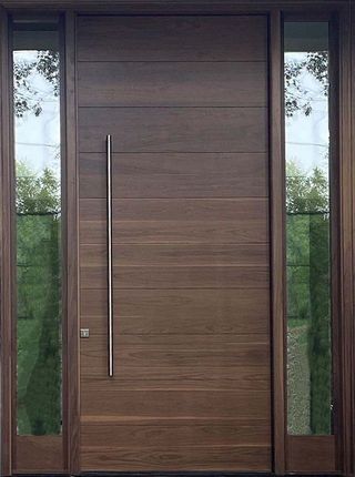 A wooden door with a stainless steel handle and two windows.