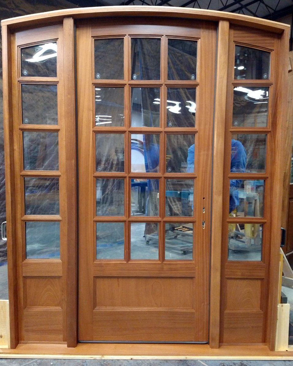 Mahogany 15 lite entry door with eyebrow top and sidelights