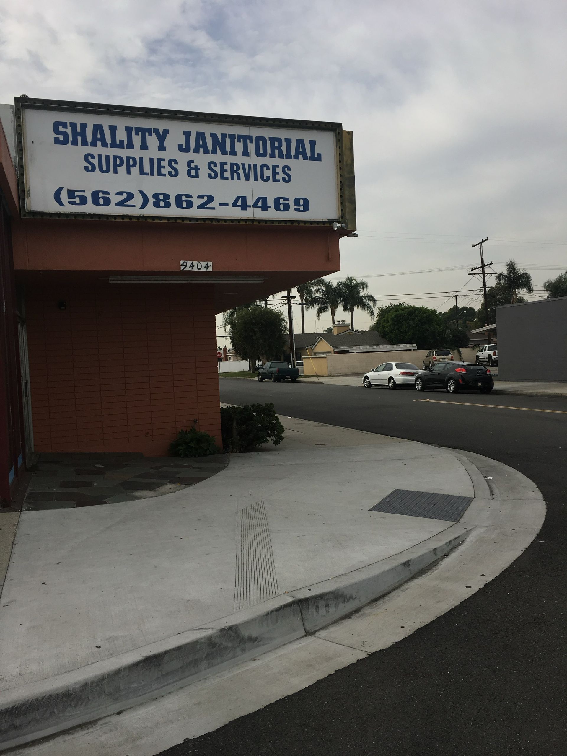 A sign for shality janitorial supplies and services