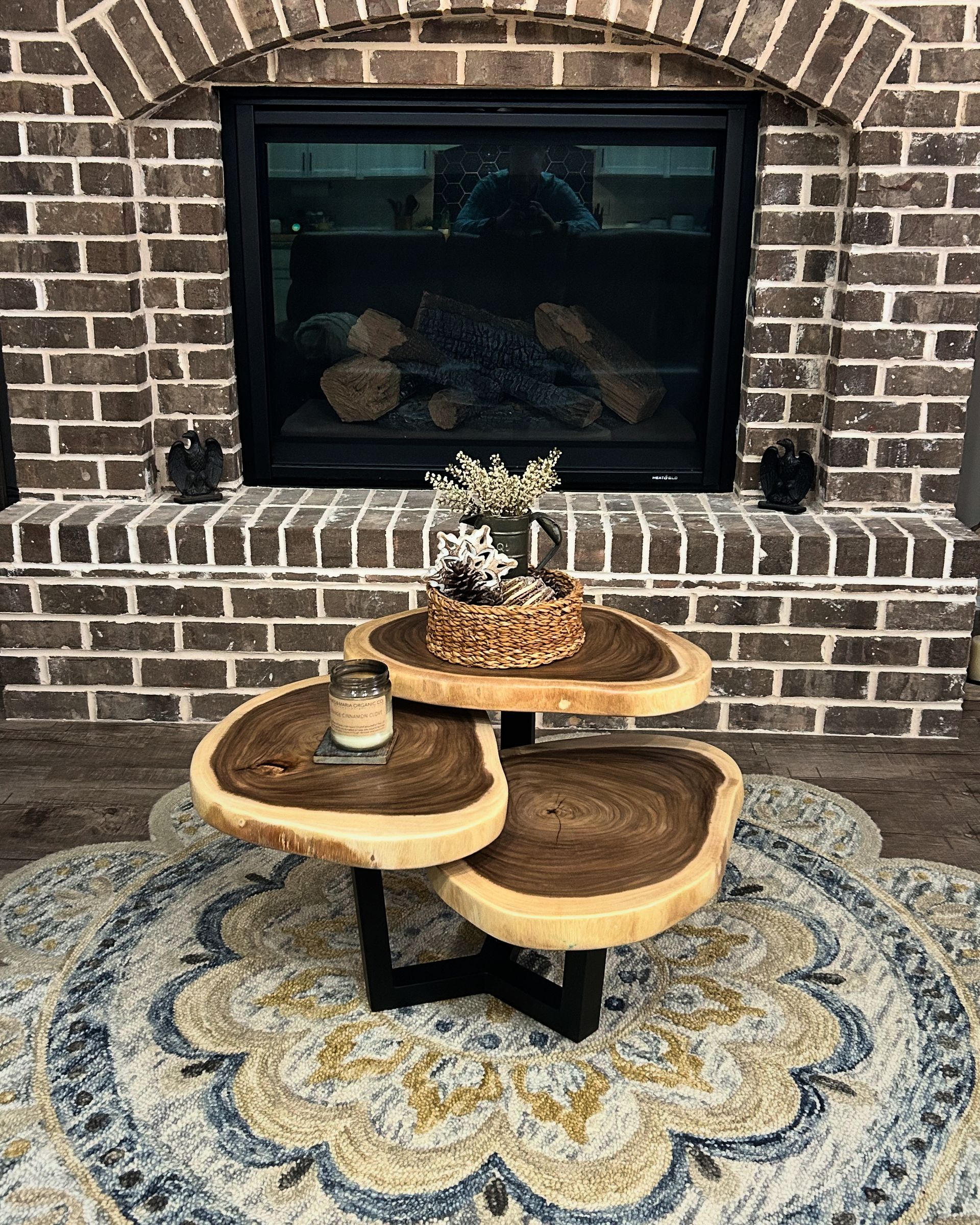 A dining room with a wooden table and chairs
