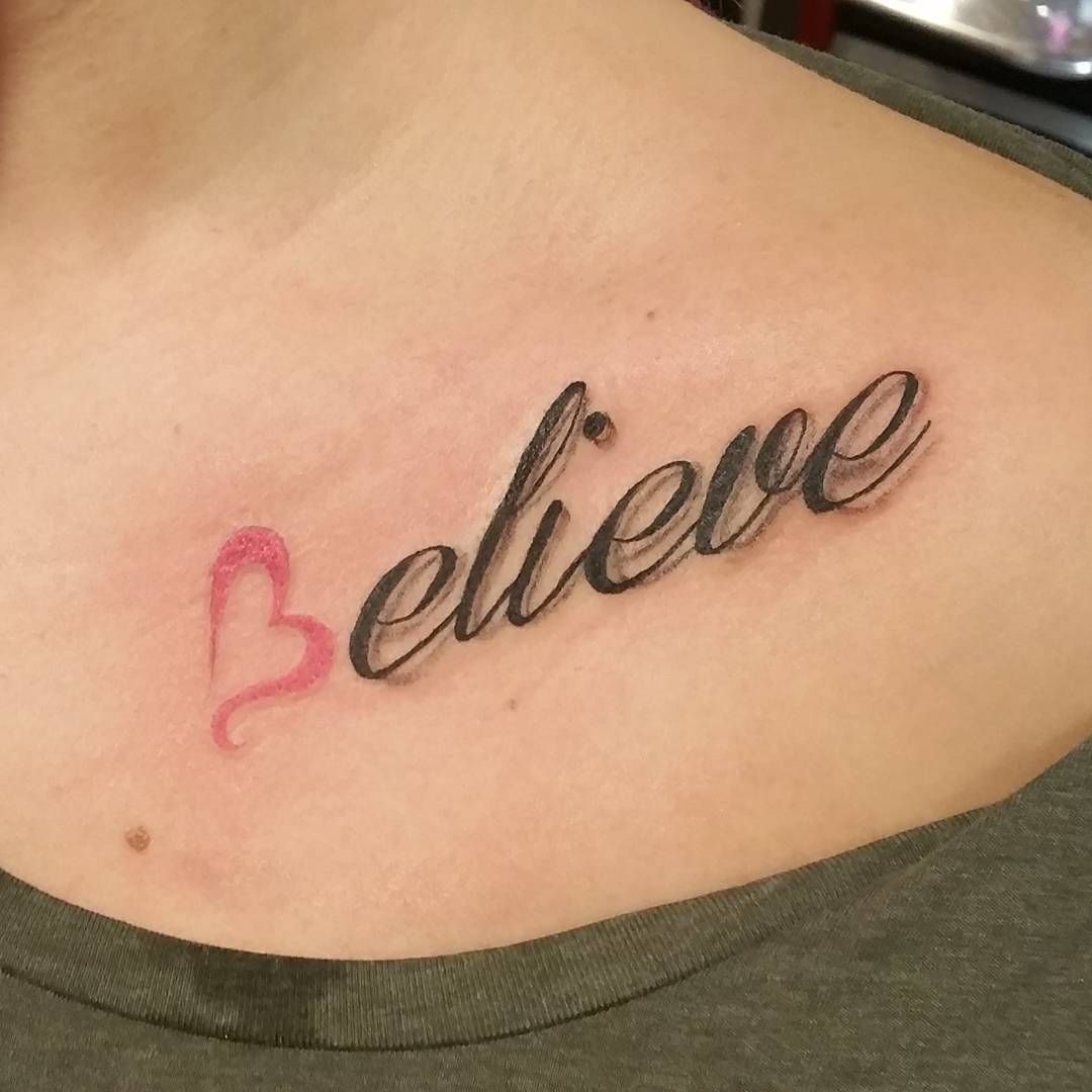 trying out a tattoo on a woman's hand