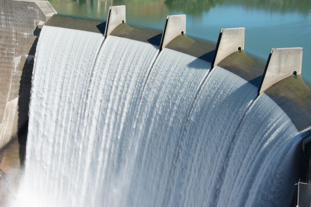 Dam With Water Cascading Over the Top, Bright Daylight — Slash Mulch Co in Googa Creek, QLD