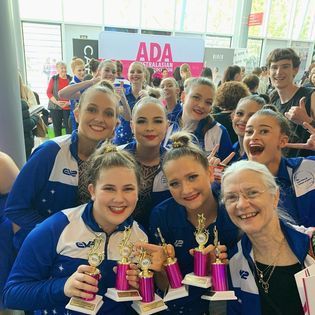 Dancers Holding Trophies  — Dance Classes In Townsville