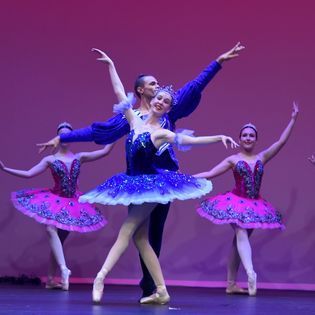 Group of People Dancing On Stage — Dance Classes In Townsville