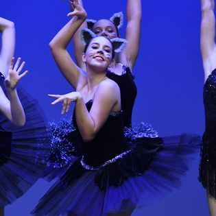 Girl Dancing On Cat Costume — Dance Classes In Townsville