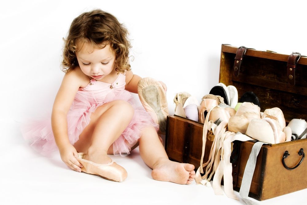 Little Girl With Ballet Shoes — Dance Classes In Townsville