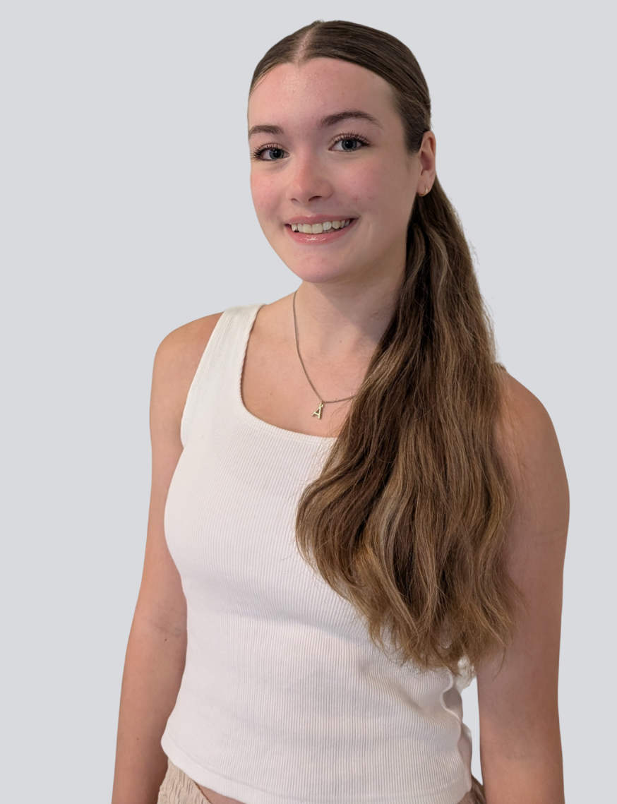 The girl is wearing a white tank top and a necklace.