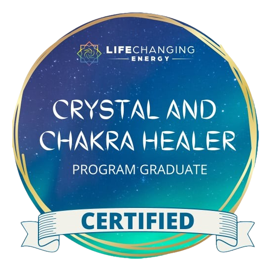 A badge that says crystal and chakra healer program graduate certified