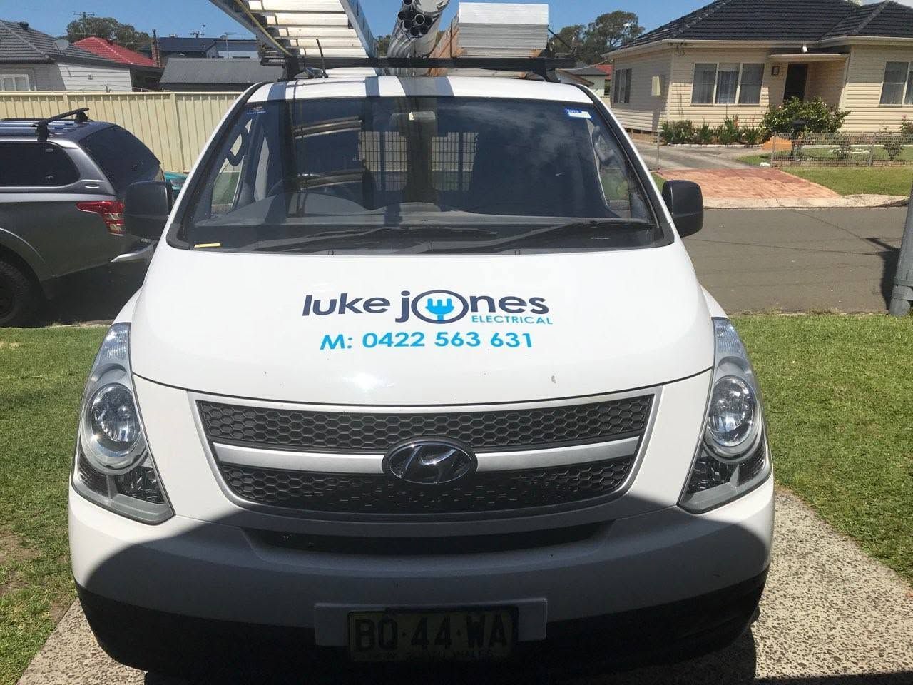 An Electrical Truck With Luke Jones Logo