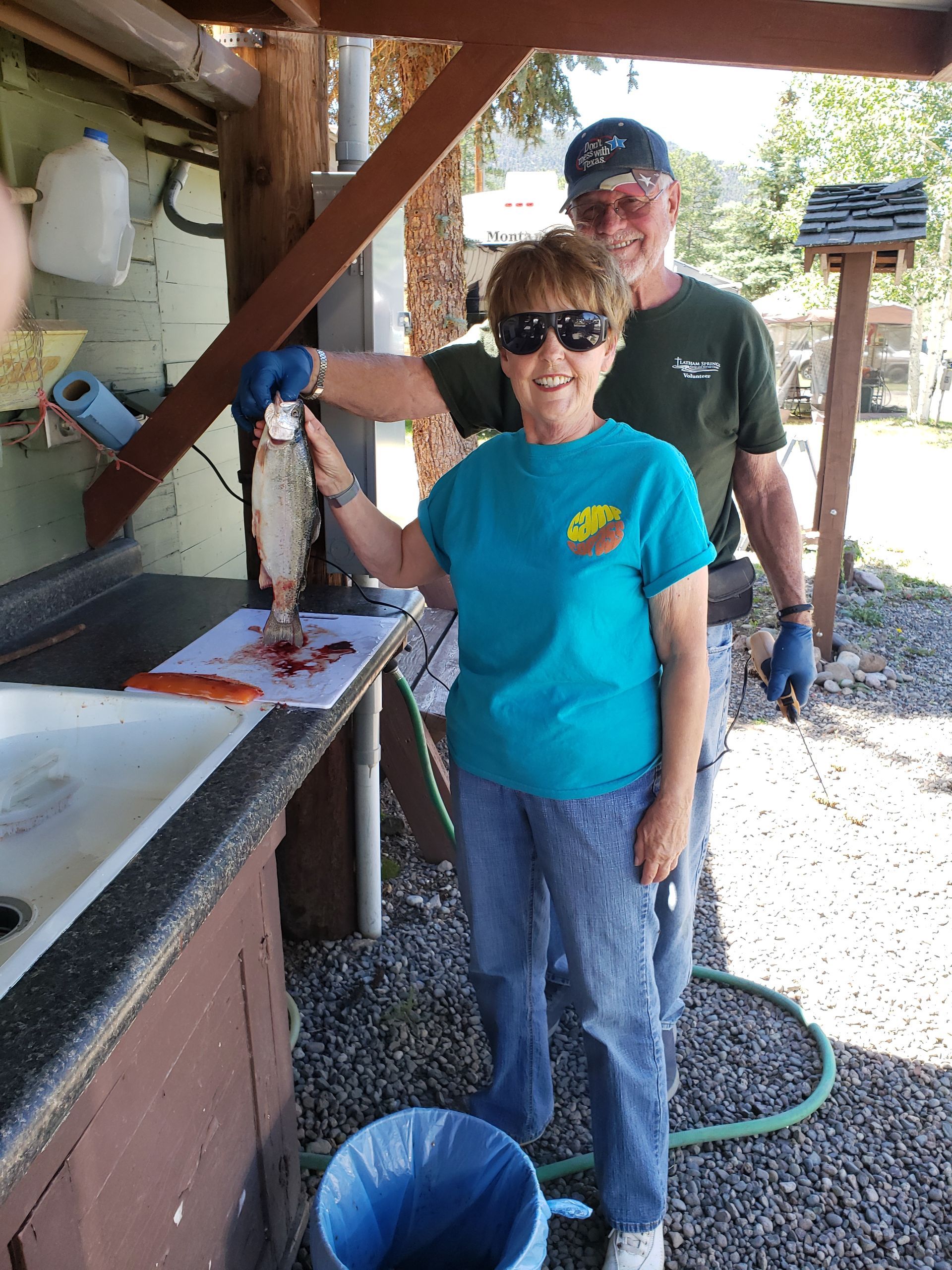 people gutting fish