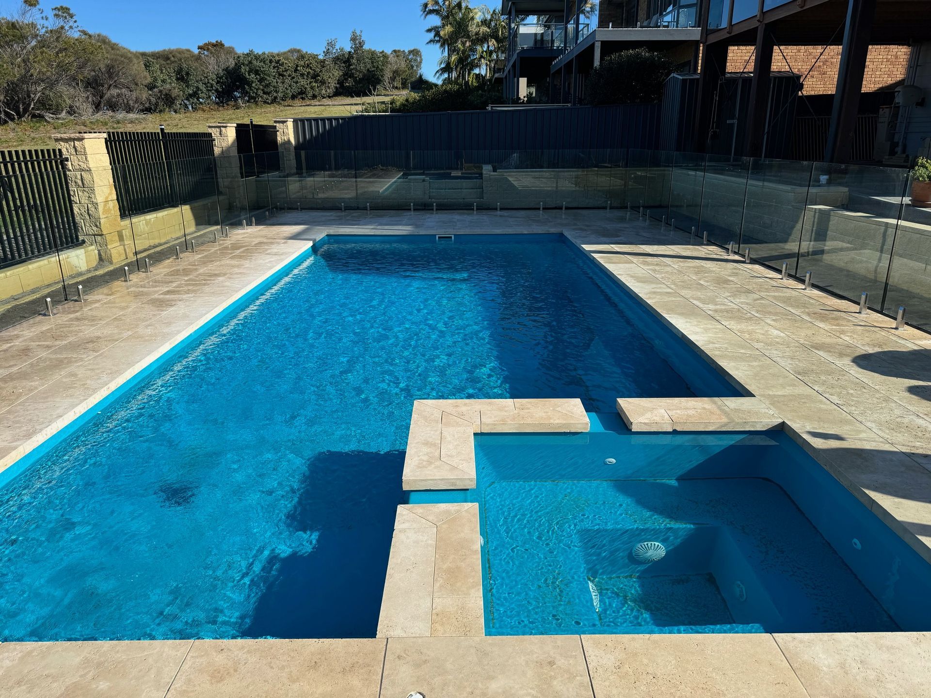 A Pool Surrounded By Pavers — Southern Bricks & Pavers In Ulladulla, NSW