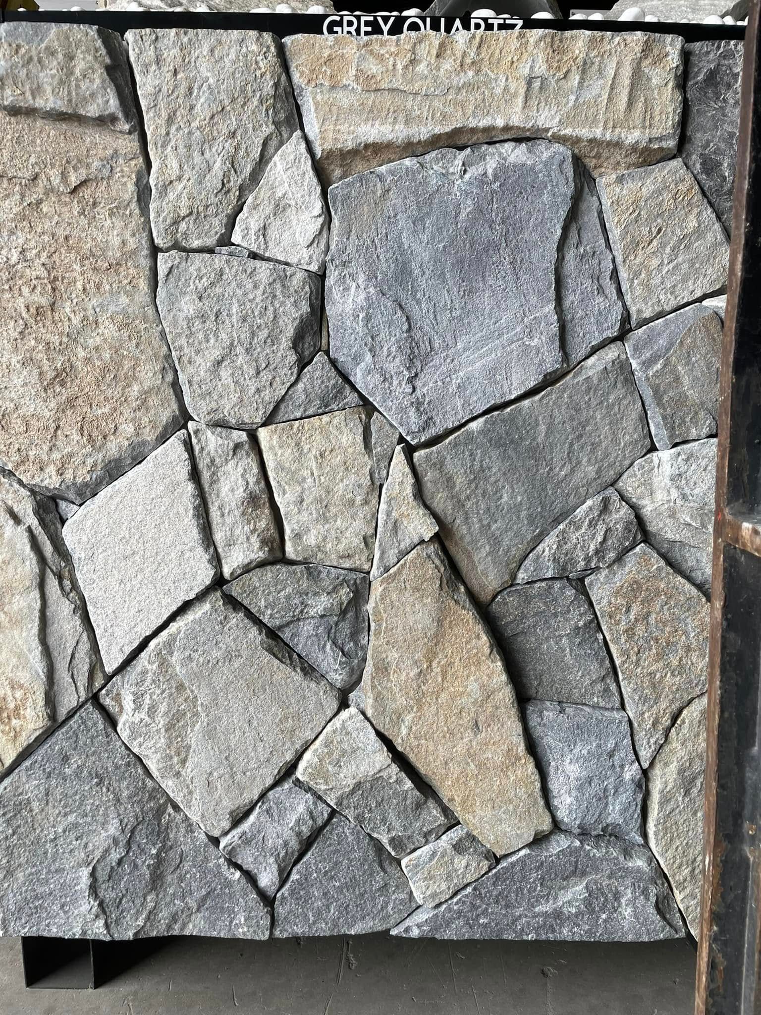 A Close Up Of A Stone Wall Made Of Large Rocks — Southern Bricks & Pavers In Ulladulla, NSW