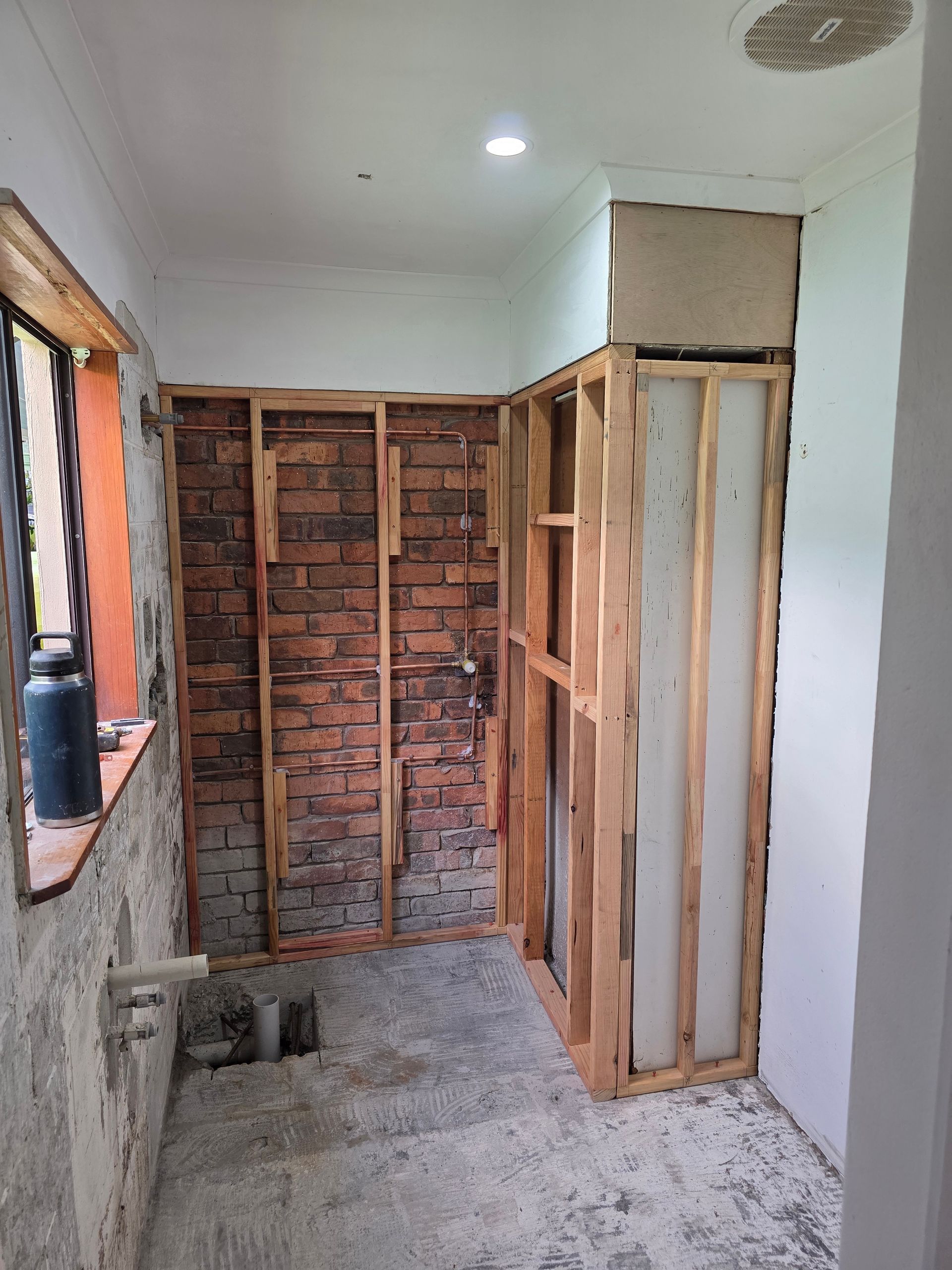 Partially Finished Bathroom With Exposed Framing — Done Right Bathrooms And Renovations in Edmonton, QLD