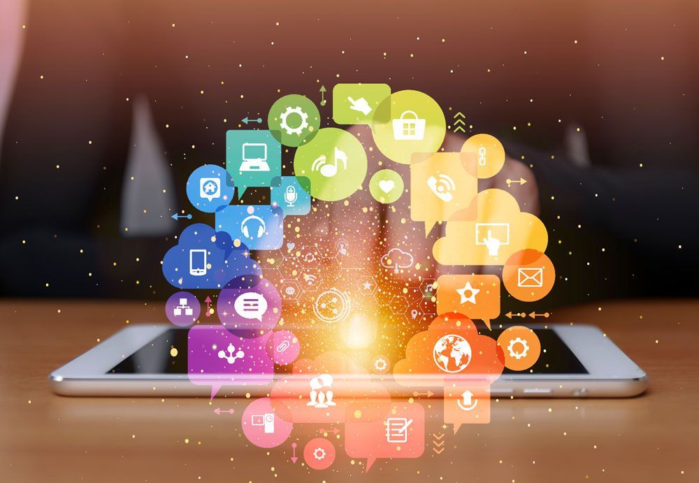 Tablet with colorful icons representing cloud computing, data, and technology.