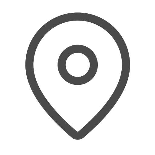 Un alfiler de mapa con un círculo en el medio.
