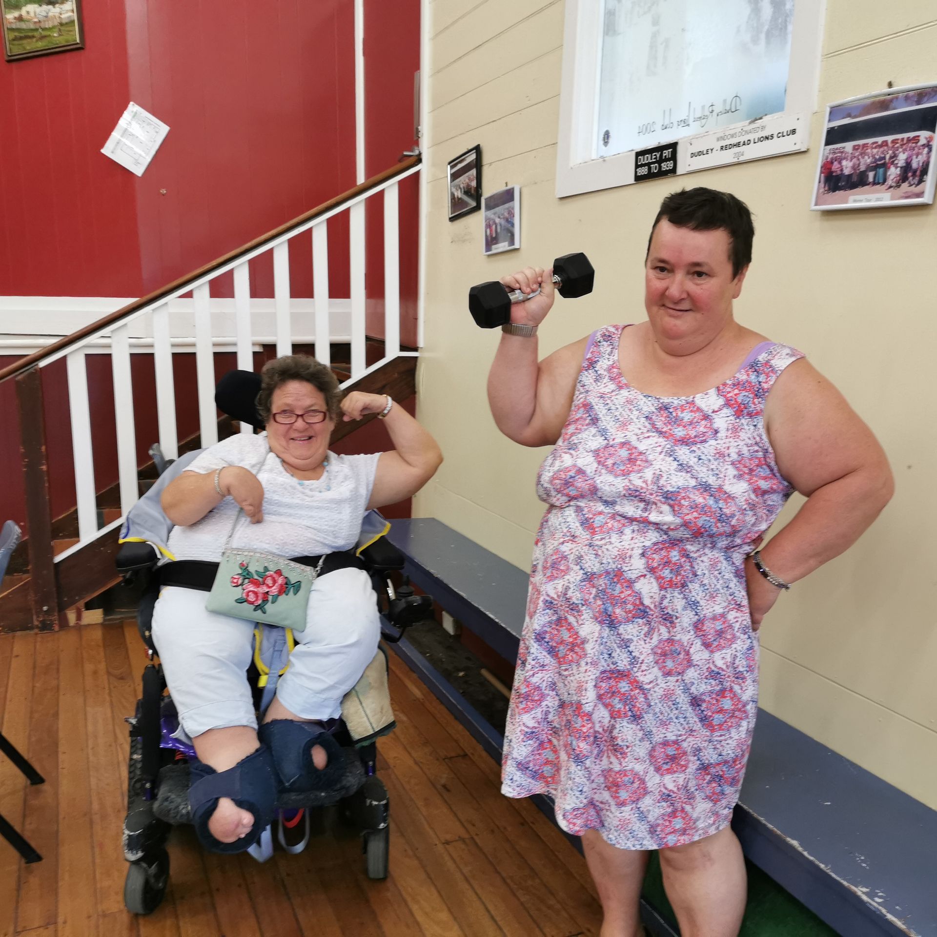 A Group of Women Are Doing Exercises With Dumbbells in a Gym —True Form Fitness In Gwandalan, NSW