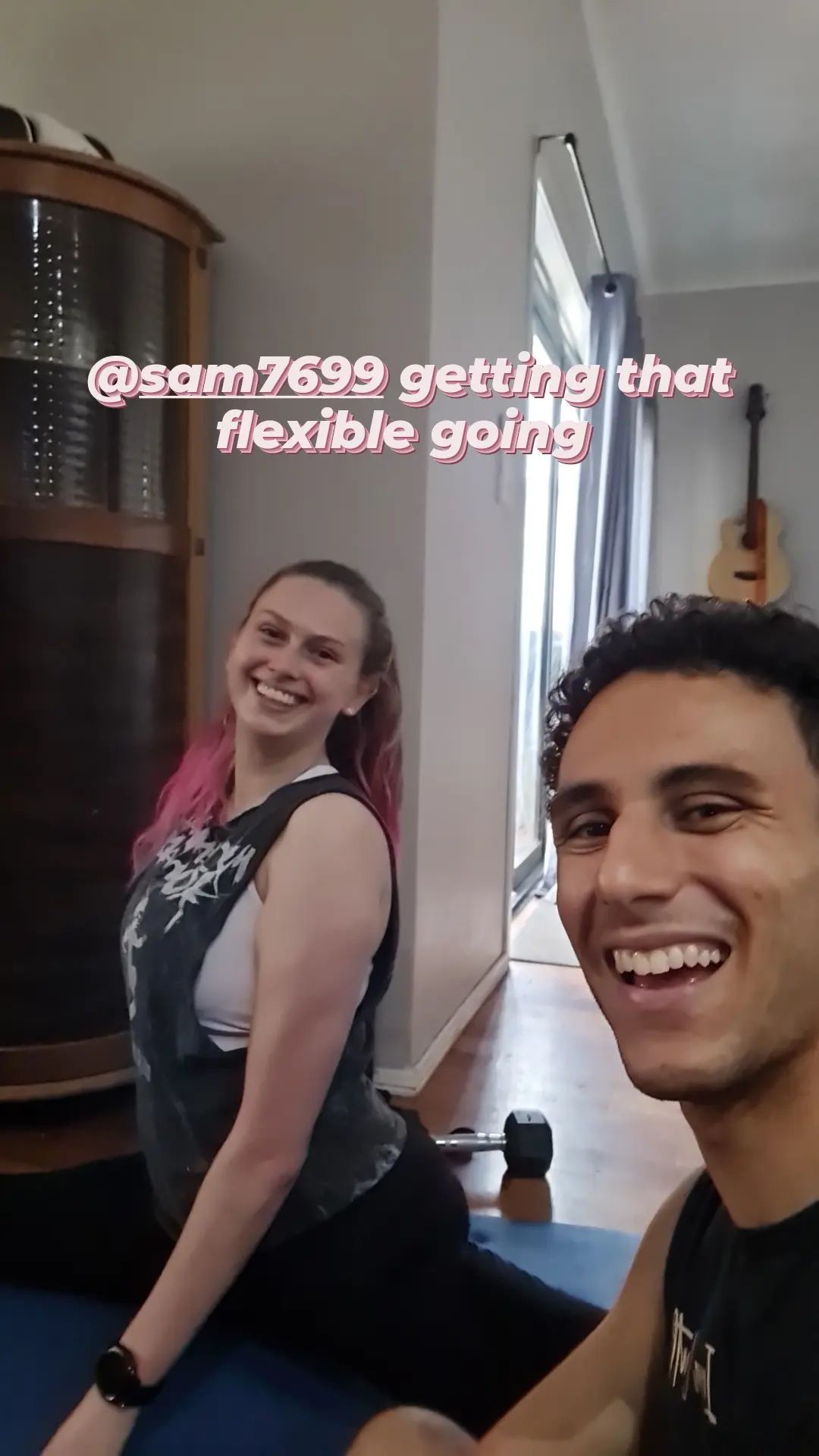 Woman stretching, smiling, with man taking a selfie —True Form Fitness In Gwandalan, NSW